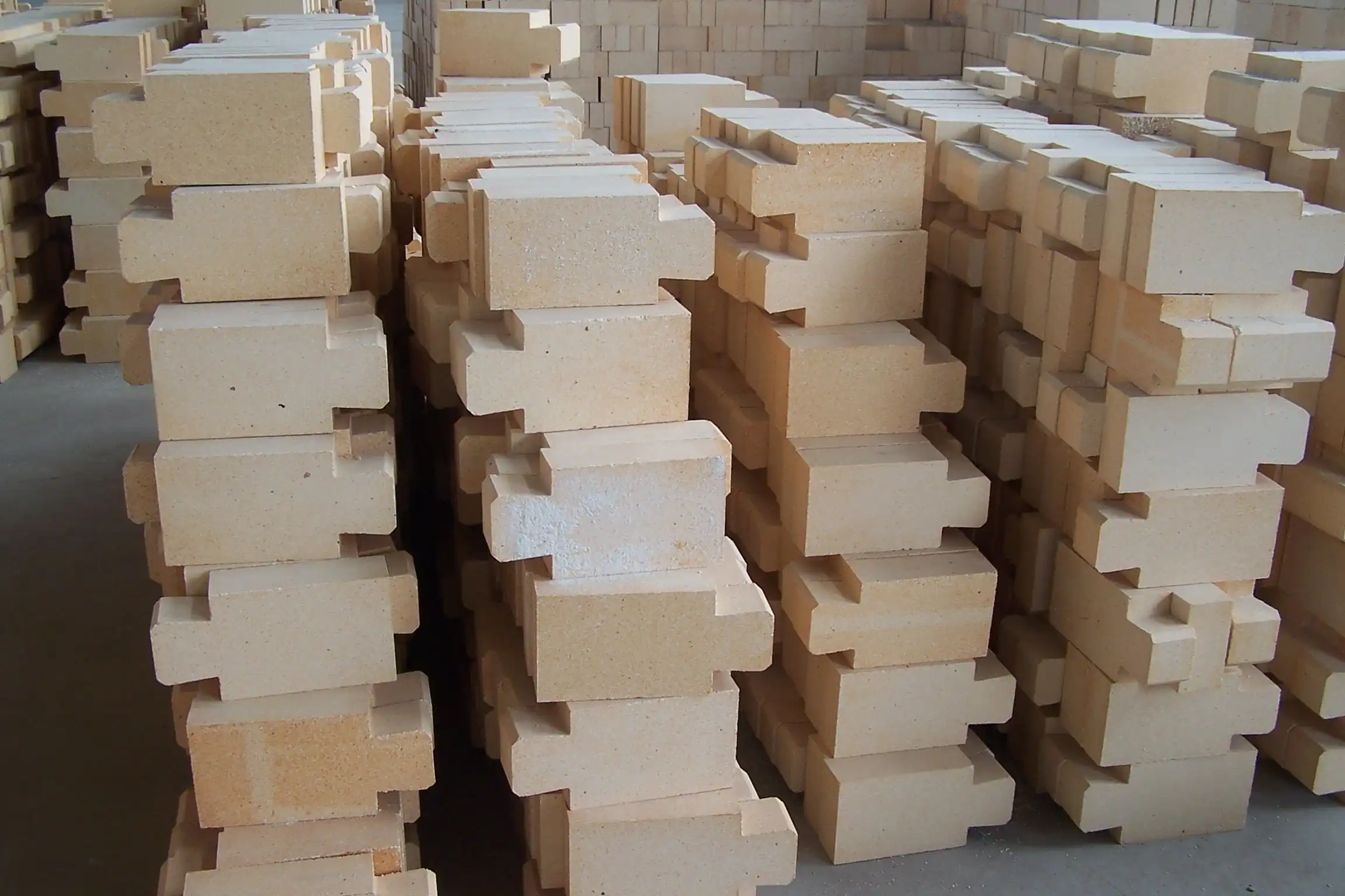 How are fire clay bricks manufactured?